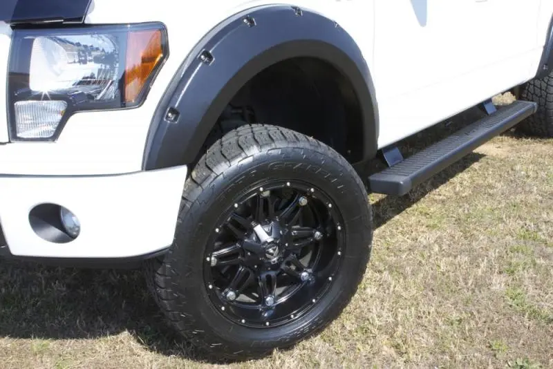 Lund 14-17 Toyota Tundra RX-Rivet Style Smooth Elite Series Black Fender Flares 4 Piece Set