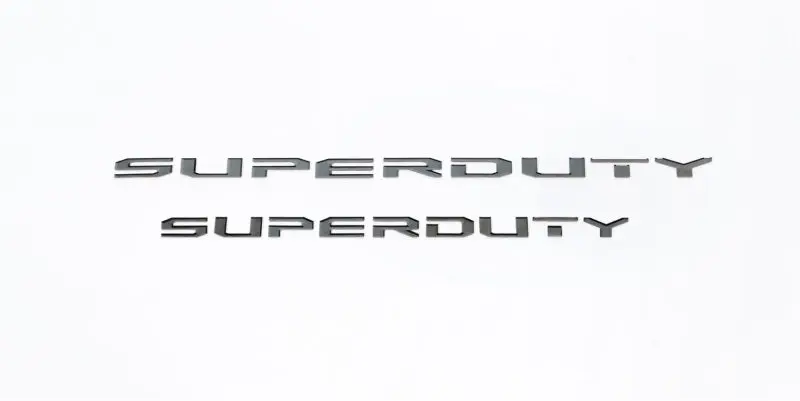 Putco 17-20 Ford Super Duty Stamped Black Platinum Hood Letters Front Emblem