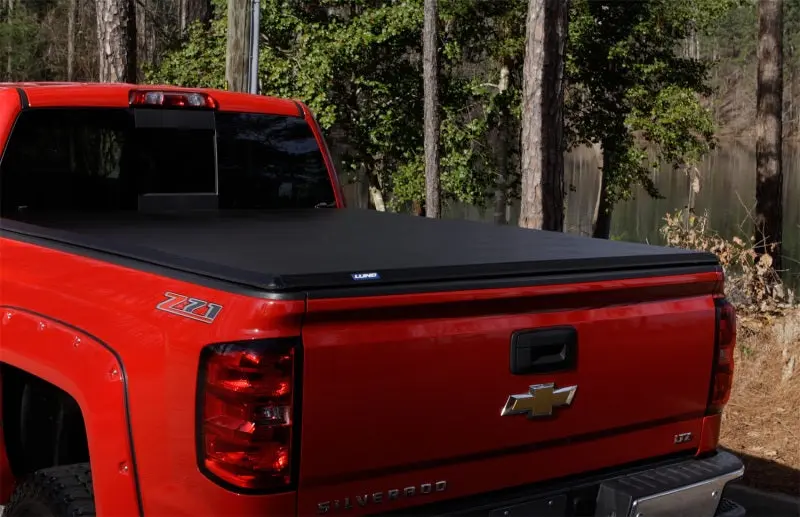 Lund 09-17 Dodge Ram 1500 Fleetside 5.7ft Bed Hard Fold Tonneau Cover Black